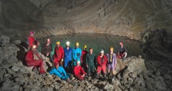 The expedition team In front of Lake Neuron.